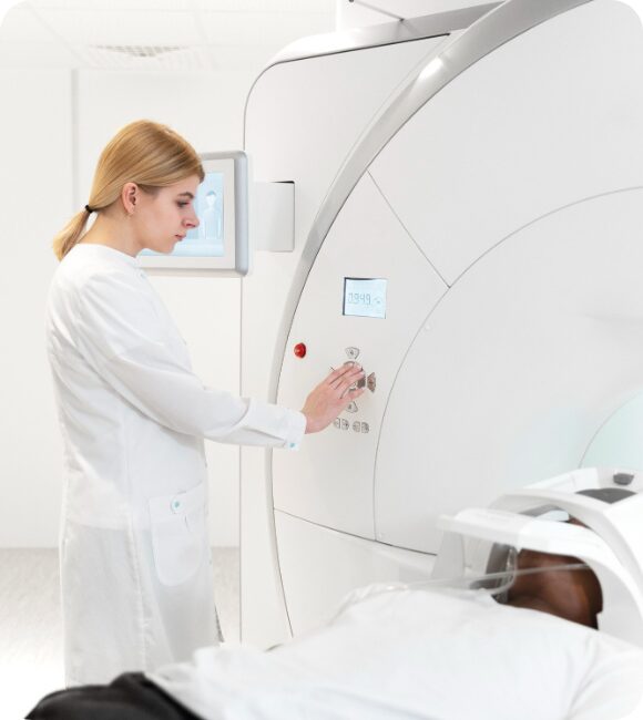 Patient undergoing an MRI scan with a 1.5 Tesla wide bore machine, ensuring comfort and high-quality imaging at Amax Healthcare