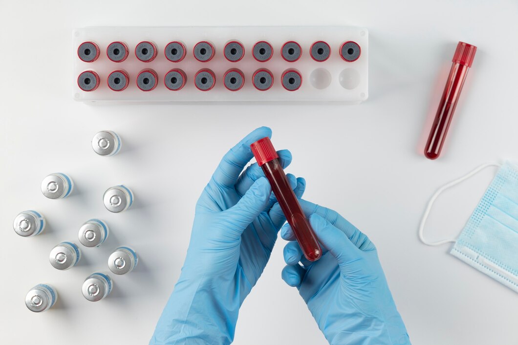 A test tube filled with blood, representing the collection process for blood tests to understand health indicators